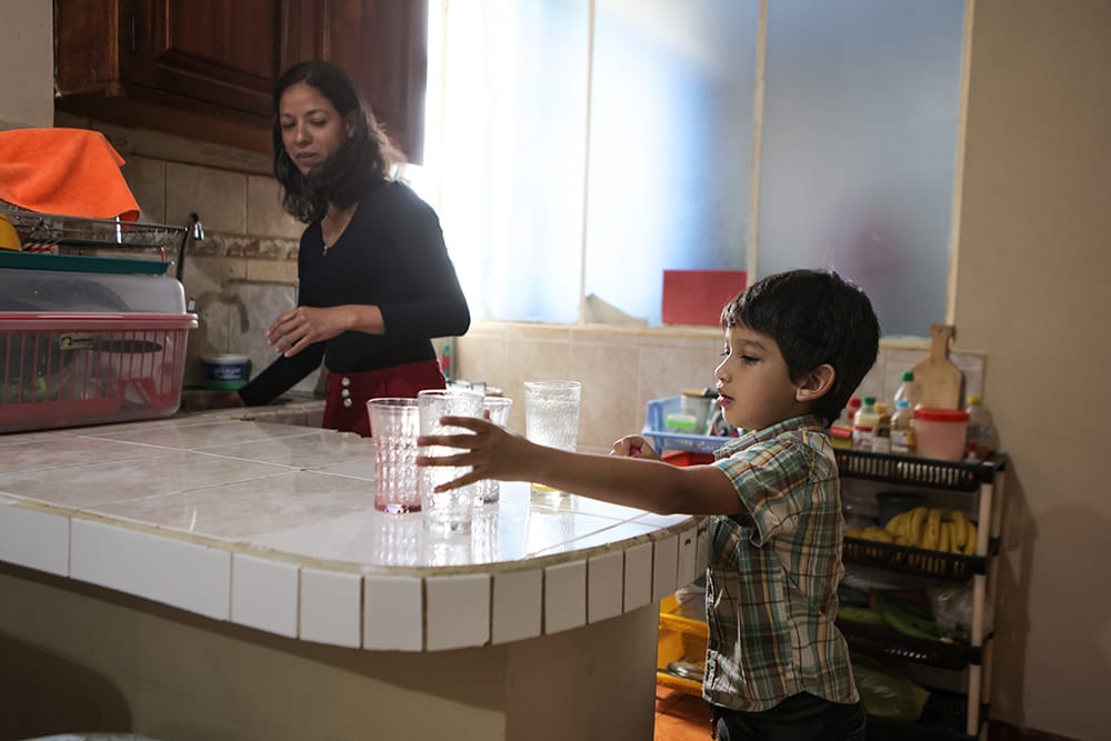 Boy and mother in kitchen.jpg